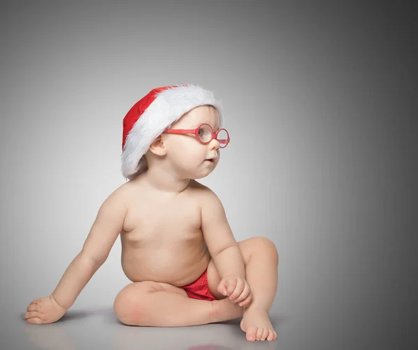 Little Baby Santa Hat Glasses Sit Color Background — Stock Photo, Image