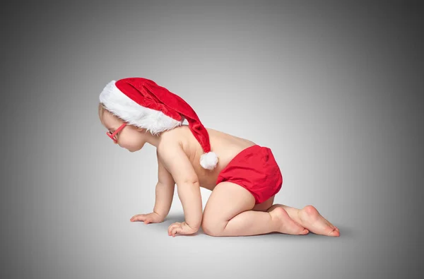Little Baby Santa Hat Glasses Crawling Gray Background — Stock Photo, Image