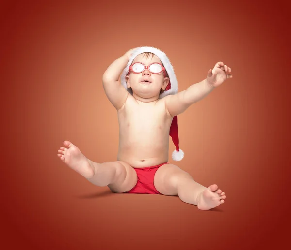 Little Cute Baby Red Santa Hat Red Glasses Barely Holds — Stock Photo, Image