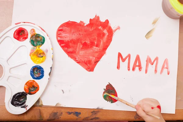 View Child Draws Brush Paints White Paper Red Heart — Stock Photo, Image