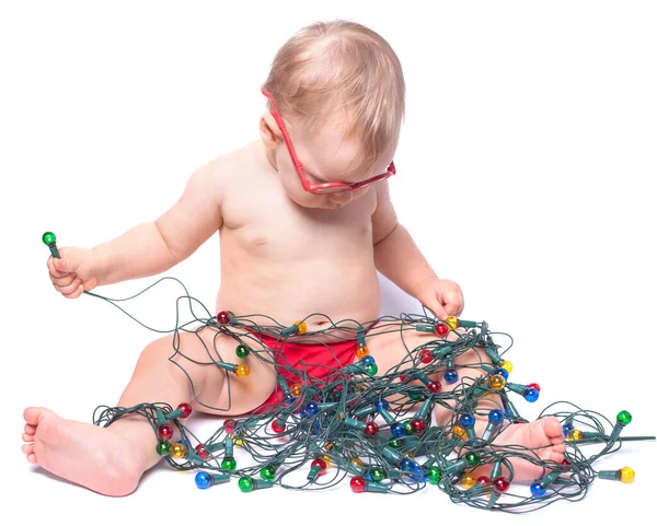 Little Girl Sitting White Background Playing Christmas Lights Isolated — Stock Photo, Image