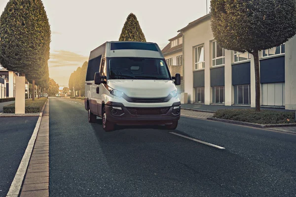 stock image transporter van on the road, symbolic picture for cargo, transportation and delivery service