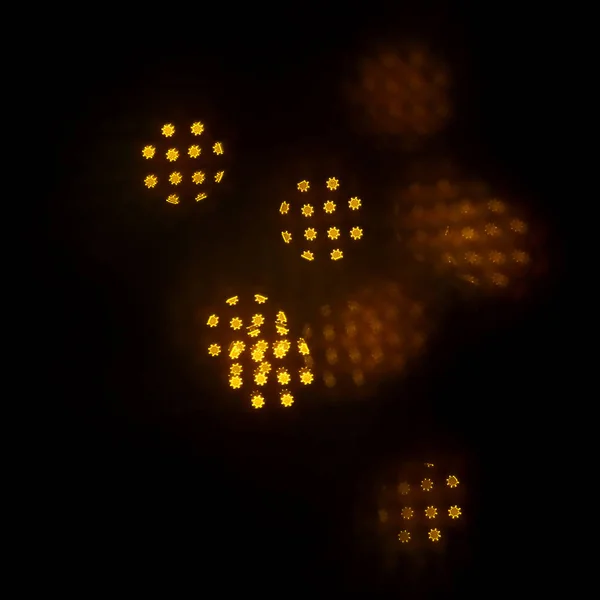 geometrik öğeleri üzerinde karanlık bir arka plan deseni ile güzel altın bokeh