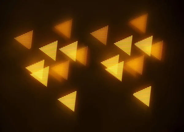 geometrik öğeleri üzerinde karanlık bir arka plan deseni ile güzel altın bokeh