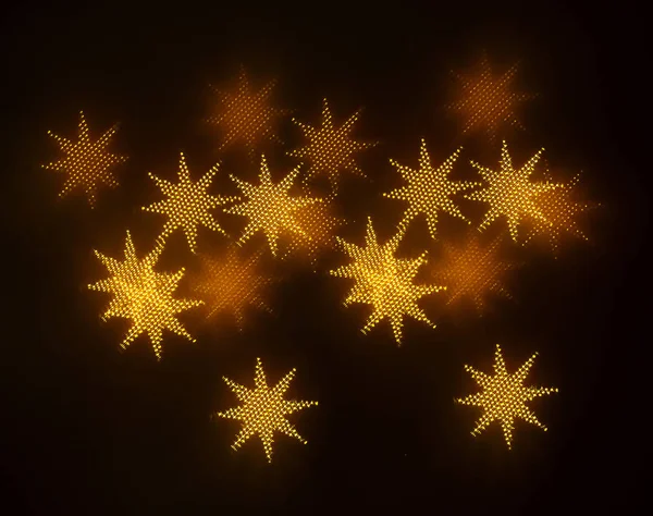 geometrik öğeleri üzerinde karanlık bir arka plan deseni ile güzel altın bokeh