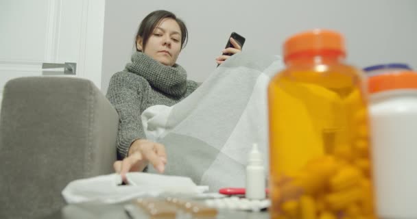 Young Ill Woman Having Runny Nose Coughing Using Smartphone Communication — Stock Video