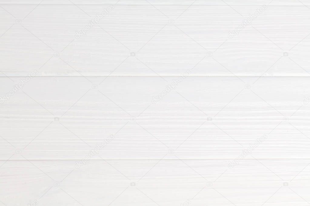 White wooden texture background with two horizontal lines.