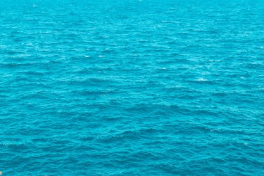 Okyanus, deniz suyu sakin dalgalar yakın. Su yüzeyi arka planı.