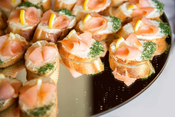 Close Small Canapes Arranged Plate Light Background Selective Focus — Stock Photo, Image