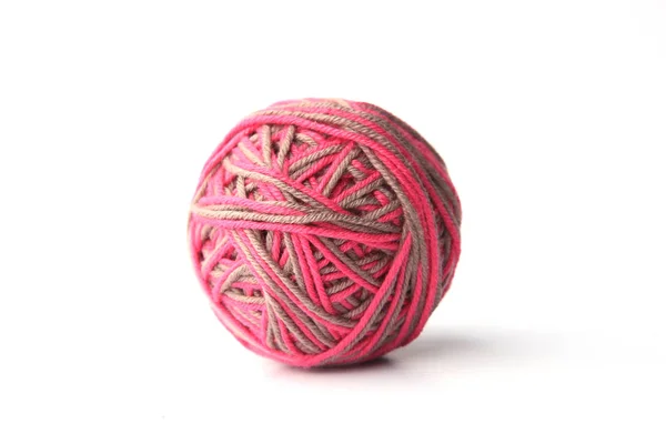 Colorful cotton thread ball from two color pink and grey thread  isolated on white background.  Different color pink and grey thread mix.