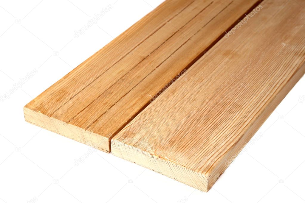 Two larch wood plank boards isolated on white background. Wood planks close up view.