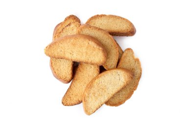 Beyaz arka plan üzerinde izole buğday Peksimet. Gevrek kuru ekmek yığını üstten görünüm dilim.