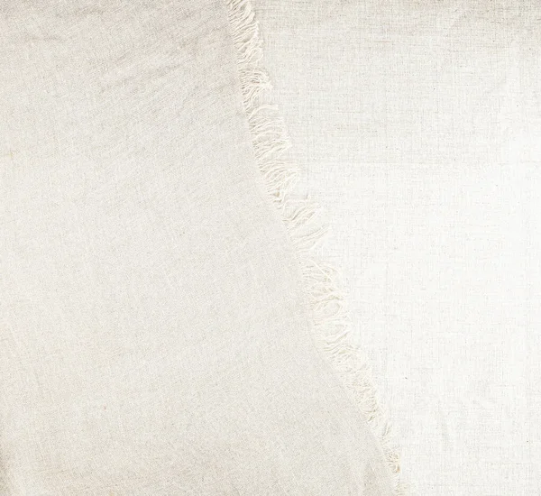 Pure washed linen cloth on linen  background. Natural washed linen fabric  with copy space
