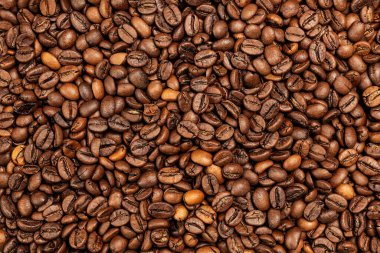 Kahve çekirdekleri. Kahverengi kavrulmuş kahve çekirdeği deseni..