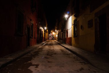 Street at night in historic town San Miguel de Allende, Guanajuato, Mexico clipart