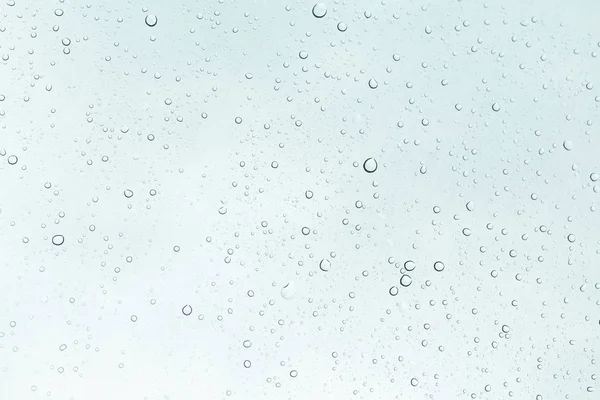 Cam Ayna arka plan üzerinde su damlası.