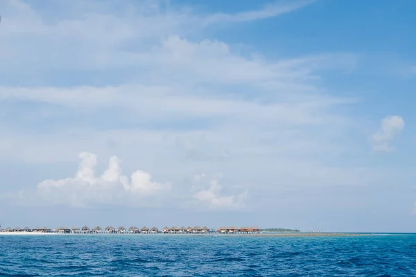 Calm Sea and Blue Sky Background in Maldives