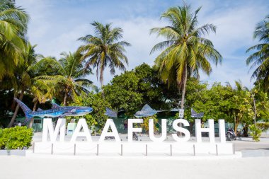 Maafushi, Maldives - Street view of Maafush island in Maldives on April 19, 2019 clipart