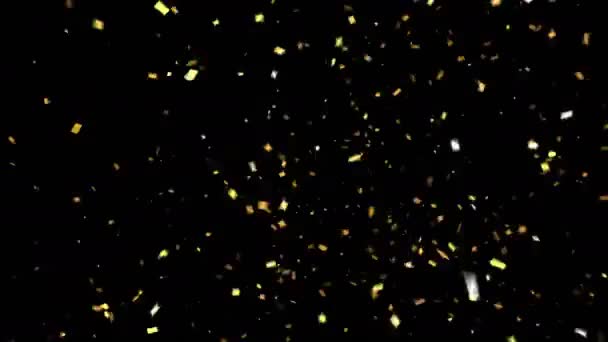 Goldene Konfetti Party Popper Explosionen auf schwarzem Hintergrund — Stockvideo