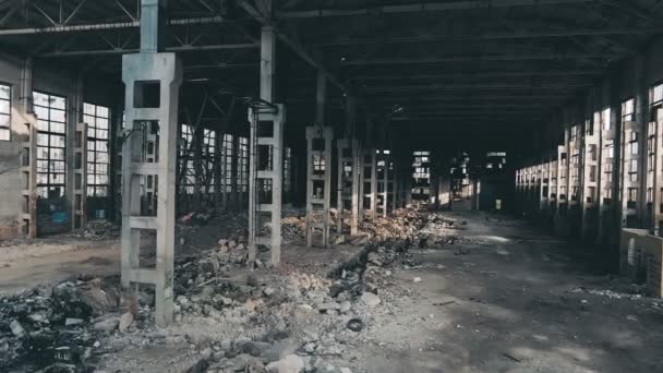 4k aerial view. Destroyed abandoned factory after the war, broken glass, destruction, frightening industrial composition — Stock Video