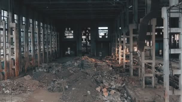 4k aerial view. Destroyed abandoned factory after the war, broken glass, destruction, frightening industrial composition — Stock Video