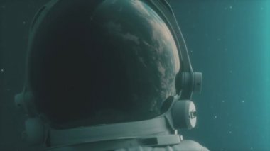Yalnız bir astronot yörüngede, uzayda Dünya gezegeni bakar, Dünya gezegeni bir uzay giysisi kask yansıtır. Sinema 4 k görüntüleri alan, Dünya gezegeni ve diğer bilimsel programlarımız için