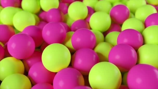 Fondo colorido de una pila de esferas abstractas amarillas y rosadas — Vídeos de Stock