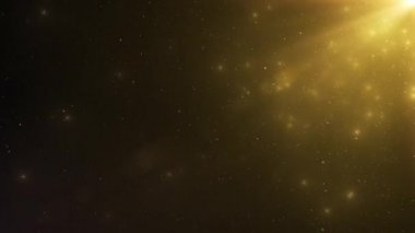 İzole siyah bir arka plan üzerinde pırıl pırıl yüzen altın toz parçacıkları ve ışık ışınları soyut arka plan. Bokeh ile havada dinamik rüzgar parçacıklarının dikişsiz döngü 3d animasyon
