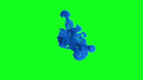 Blauwe inkt barst in slow motion op een groene achtergrond chroma toets groen scherm — Stockvideo