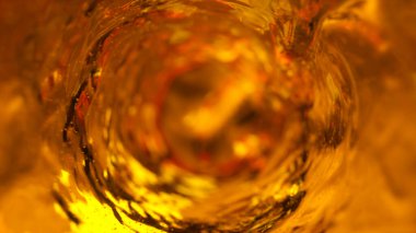 Beer with bubbles moves in a glass in slow motion. Abstract water background. 3d illustration clipart