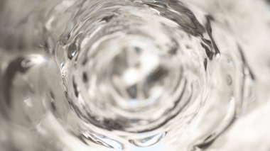 Su kadehte ağır çekimde hareket eder. Soyut su arka planı. 3d illüstrasyon
