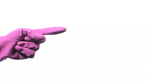 Hand with purple rubber glove is pointing towards on white background — Stock Video