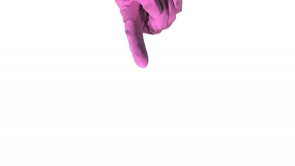 Hand with purple rubber glove is pointing towards on white background — Stock Video