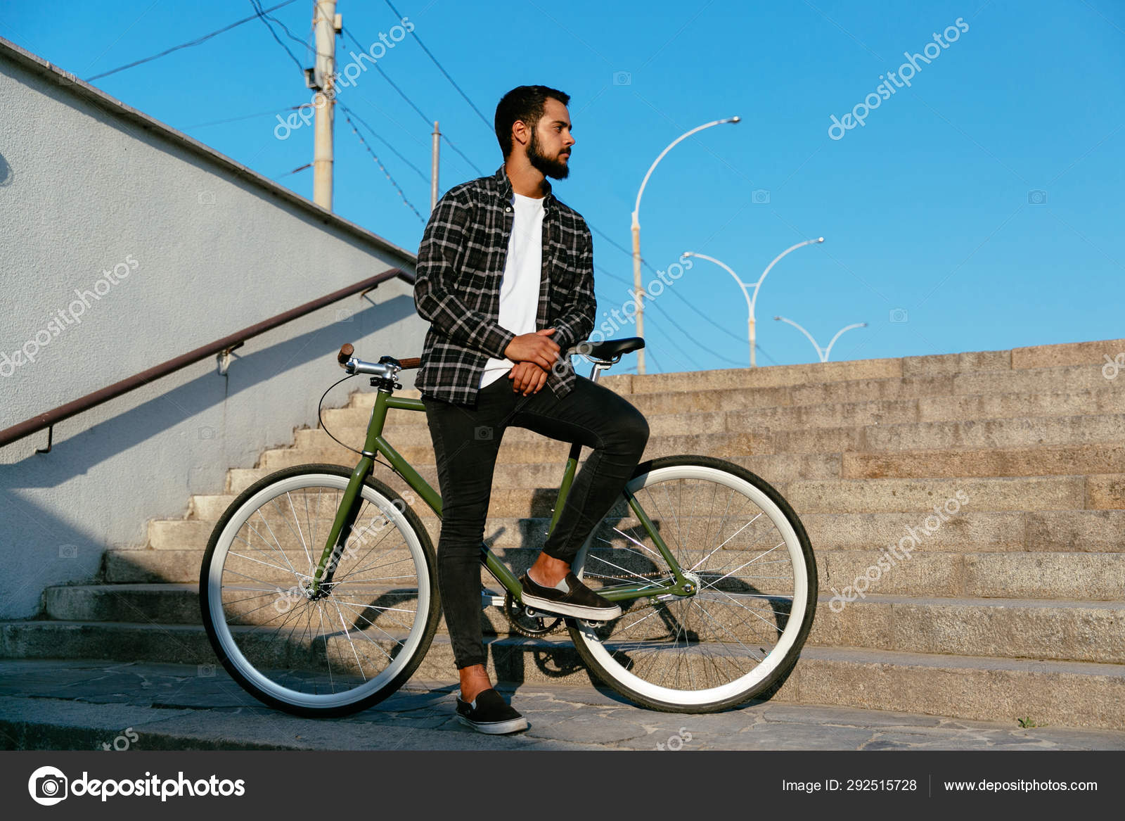 standing on bike