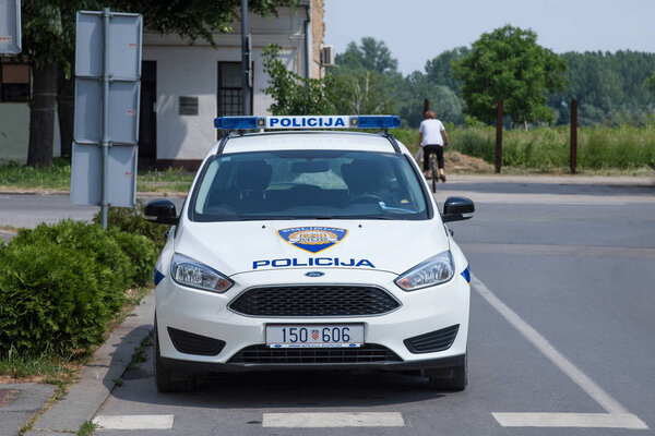 VUKOVAR, CROATIA - MAY 13, 2018: Croatian police forces car built by Ford. The Croatian police is also known as MUP, or Policija, and is controlled by the ministry of internal affairs