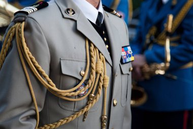 BELGRADE, SERBIA - JULY 14, 2018: Close up on the formal uniform of the French Army, Ground Forces (Armee de Terre, DGRIS Division) during a ceremony in the Belgrade French Embassy clipart