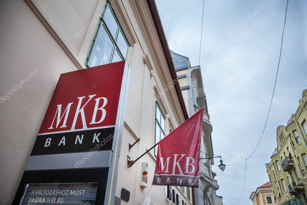 SZEGED, HUNGARY - JULY 4, 2018: MKB Bank logo on their main office for Szeged in the city center. MKB is one of the biggest domestics banks of Hungary
