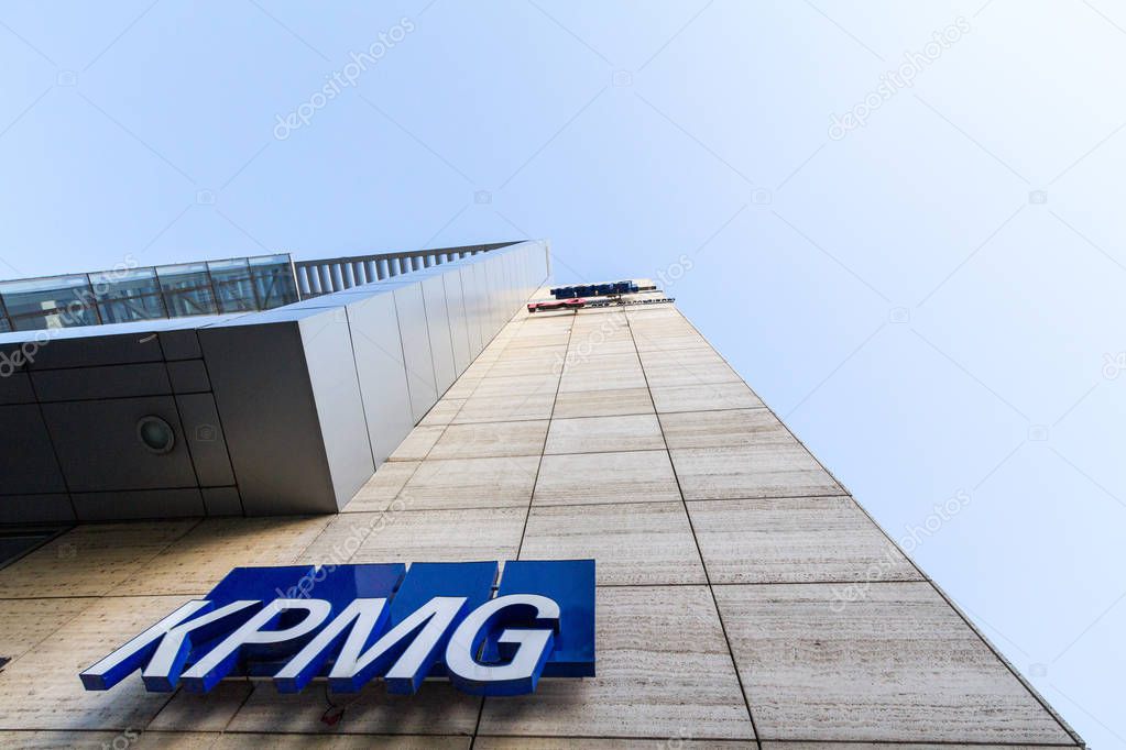 BELGRADE, SERBIA - JULY 21, 2018: KPMG logo on their main office for Serbia in Belgrade, in a business district. KPMG is one of the main audit firms in the world, within the Big Four Group