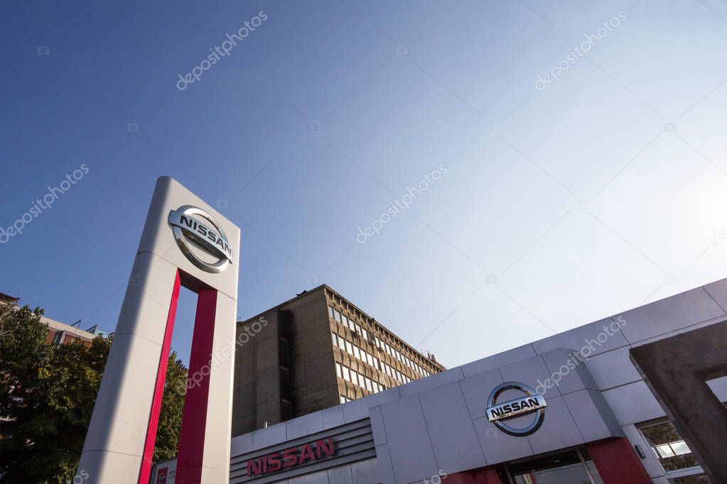 BELGRADE, SERBIA - SEPTEMBER 10, 2018: Nissan logo on their main dealership store Belgrade. Nissan is a Japanese car and automotive manufacturer, part of Renault group