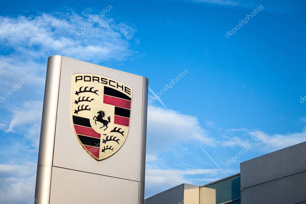 BELGRADE, SERBIA - OCTOBER 7, 2018: Porsche logo on their main dealership store in Belgrade. Porsche is a German car and automotive manufacturer, specialized in luxury sports vehicles