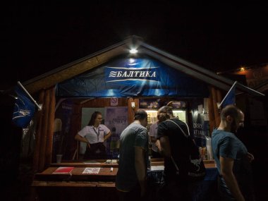 BELGRADE, SERBIA - AUGUST 18, 2018:  Baltika  logo on on a summer bar. Baltika is a lager, export style, brewed in Russia, and one of the symbols of Russian beers clipart