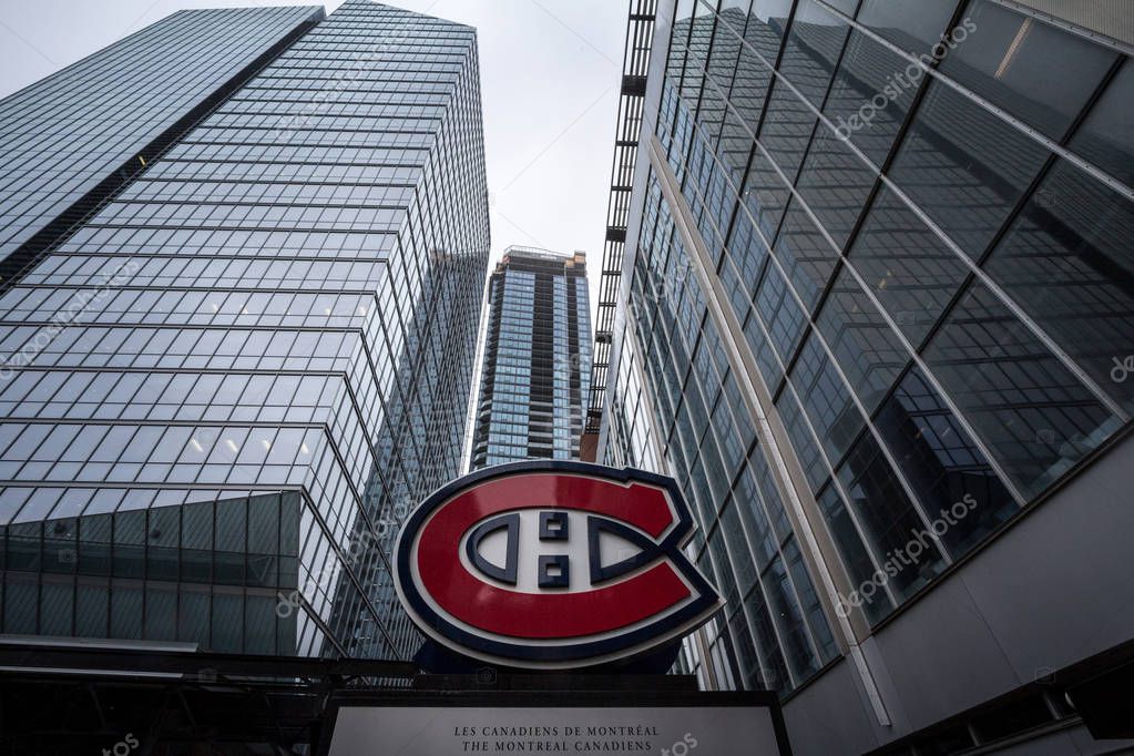 MONTREAL, CANADA - NOVEMBER 3, 2018: Montreal Canadiens logo, known as Canadiens de Montreal, in front of their main arena, the Centre Bell. Canadiens is Montreal NHL Ice Hockey Team