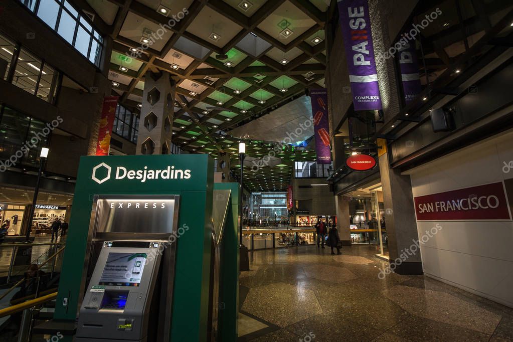 MONTREAL, CANADA - NOVEMBER 6, 2018: Desjardins Bank logo on their ATM in Desjardins Complex Mall. This financial institution is one of the main banks from Quebec