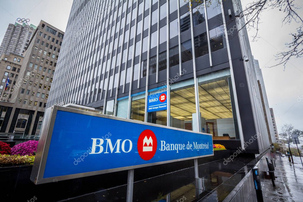 MONTREAL, CANADA - NOVEMBER 3, 2018: Bank of Montreal logo, known as BMO, in front of their main office. Called as well banque de Montreal, it is one of the main banks of Quebec and America