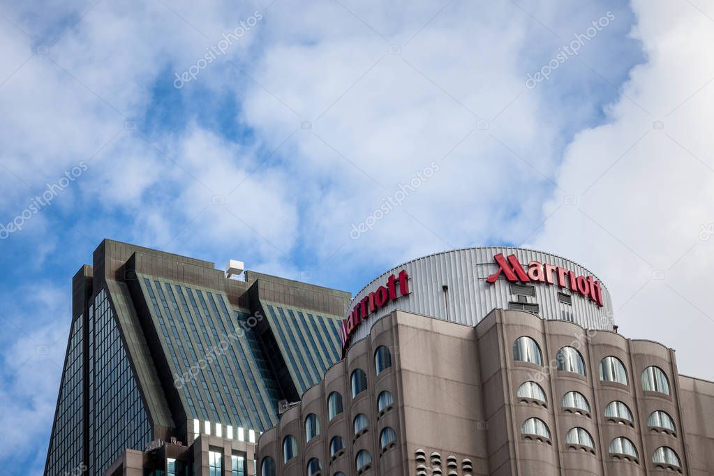 MONTREAL, CANADA - NOVEMBER 7, 2018:  Marriott logo on their main hotel in Montreal, Quebec. Marriott Corporation is a worldwide brand, owner and franchise of luxury hotels