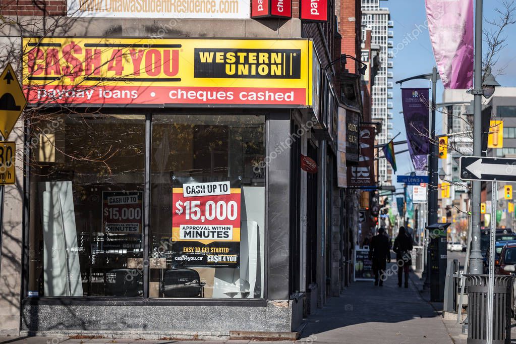 OTTAWA, CANADA - NOVEMBER 11, 2018: Cash4you logo in front of their boutique in Ottawa, Ontario. Cash 4 you is a personal finance retailer specialized in cashing cheques, cash advance & payday loans