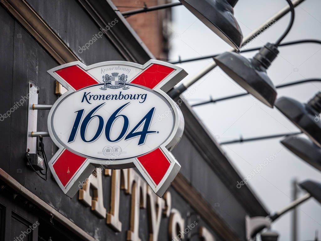 OTTAWA, CANADA - NOVEMBER 12, 2018: Kronenbourg 1664 beer logo on a local pub in Ottawa, Ontario. 1664 is a French lager produced in Eastern France exported worldwide
