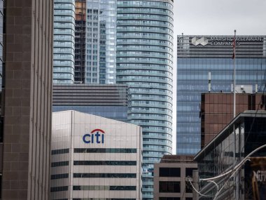 TORONTO CANADA - NOVEMBER 13, 2018: Logo of Citigroup on their main office in Toronto, Ontario, Quebec. Also called Citi, or Citibank, it is an American bank and financial institution clipart
