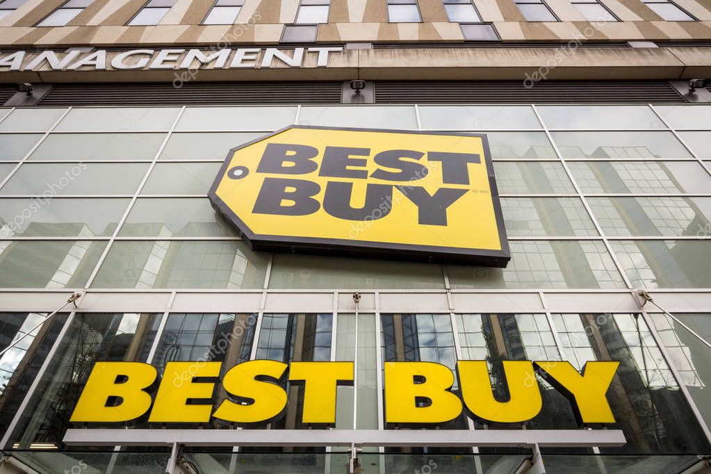 TORONTO, CANADA - NOVEMBER 13, 2018: Best Buy Logo in front of their store for downtown Toronto, Ontario. Best Buy is a multinational consumer electronics retailers
