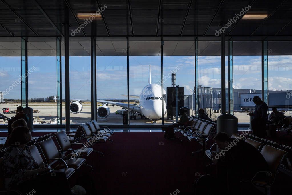 PARIS, FRANCE - NOVEMBER 2, 2018: Passengers waiting to board an Airbus A380 plane in terminal 2E of Roissy Charles de Gaulle Airport in Paris, the main hub of French airlines